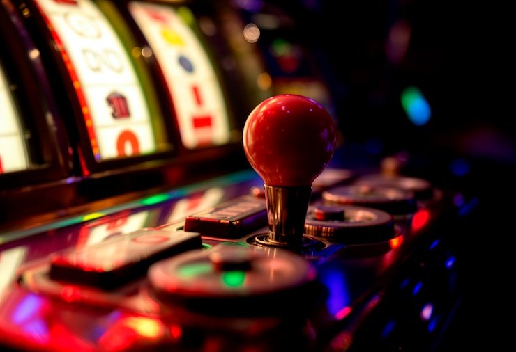 Nolimit City table displayed on mobile phone screen with chat panel and bet controls
